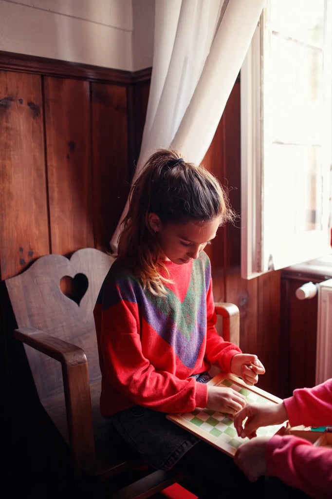 Terry sweater - Rood met multikleur driehoekprint